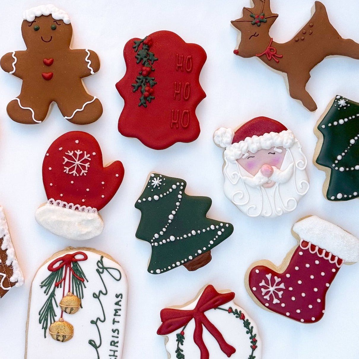 Collection of Christmas-themed cookies on a white background