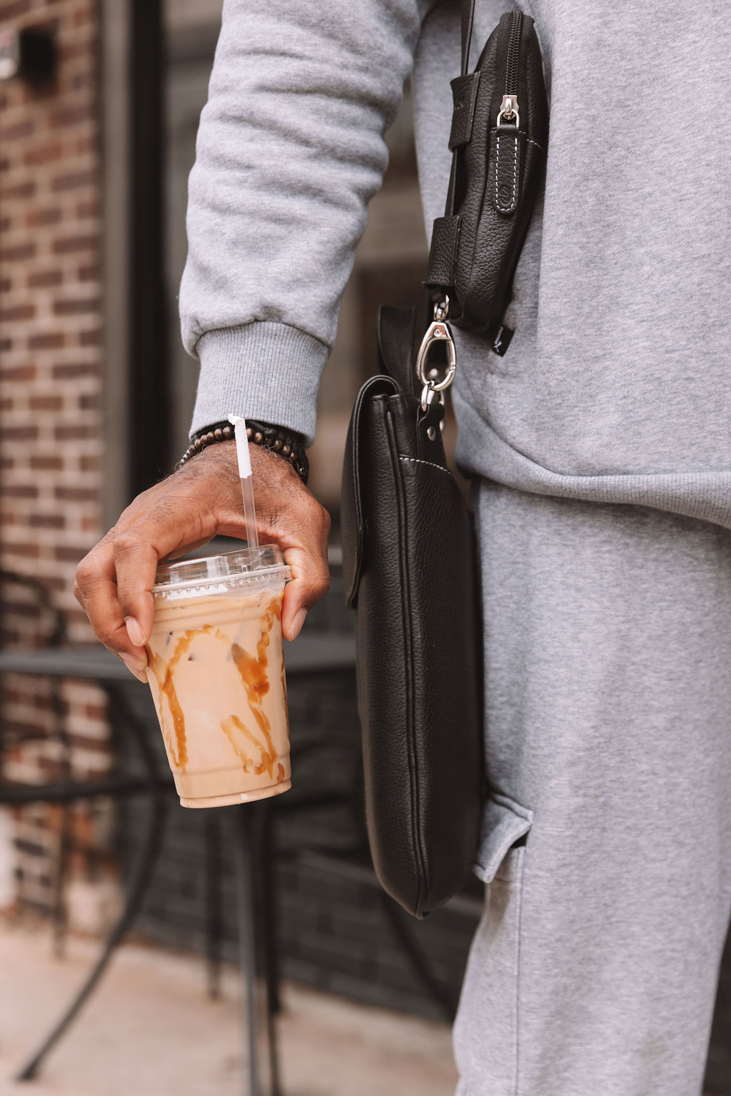 Iced latte on the sidewalk outside Sage