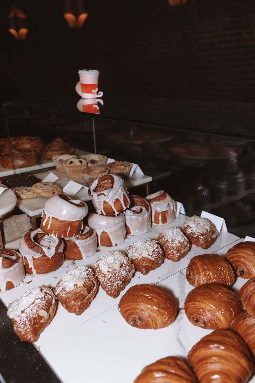 Pastry display case full of fresh bakes